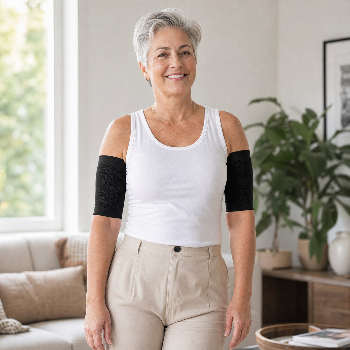 Black smooth arm sleeves worn as a pair