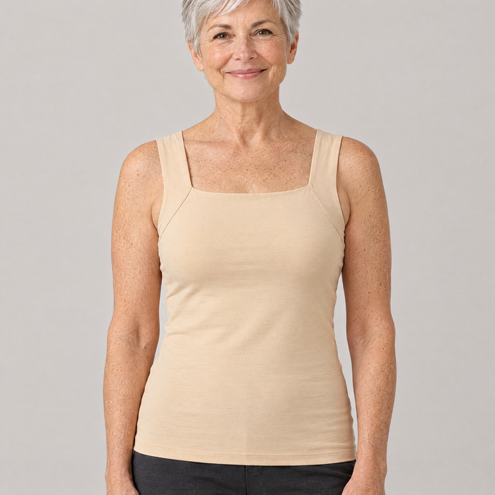 Woman wearing the Shapova Comfort Tank with built-in bra in nude, front view